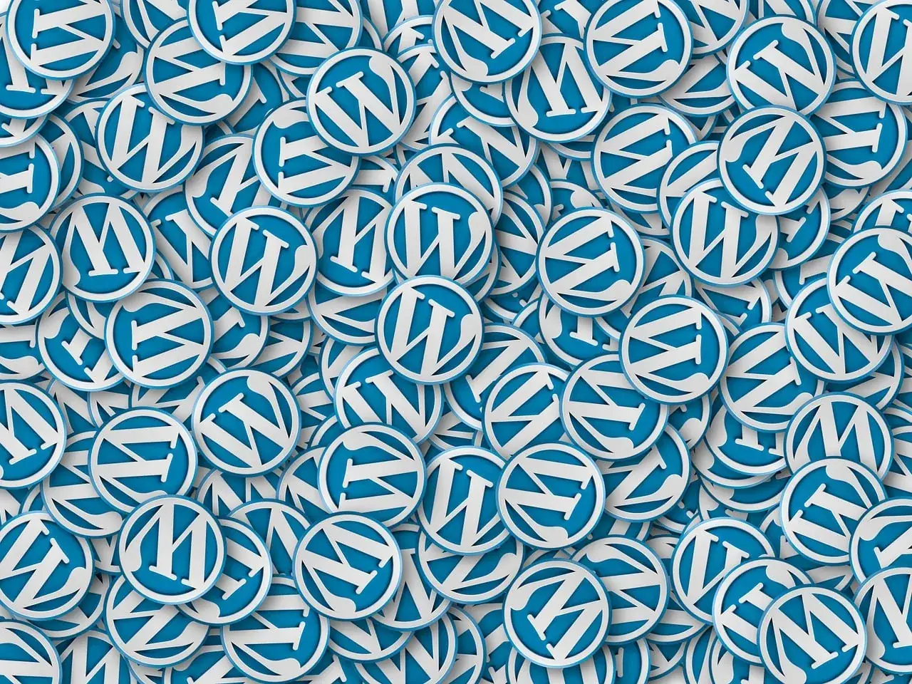 Una distesa di spille con il logo di WordPress